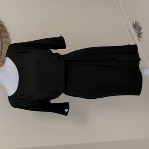Small classic black Jessica Simpson dress with open arm slits